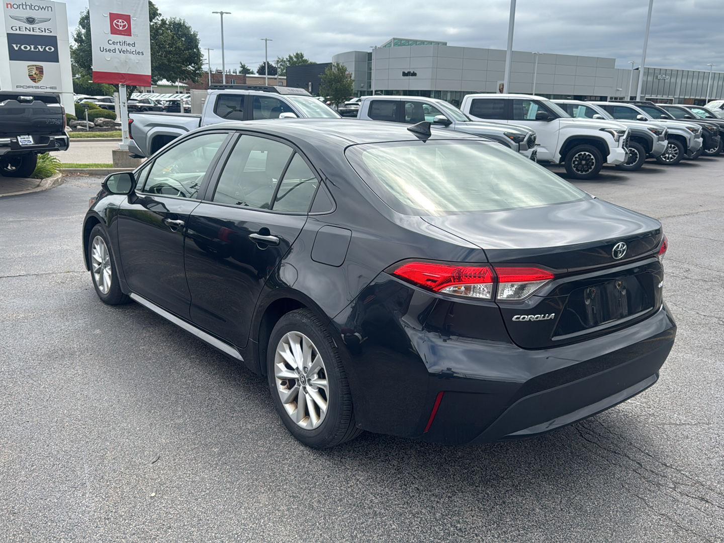 Certified Used 2021 Black Sand Pearl Toyota LE image 4