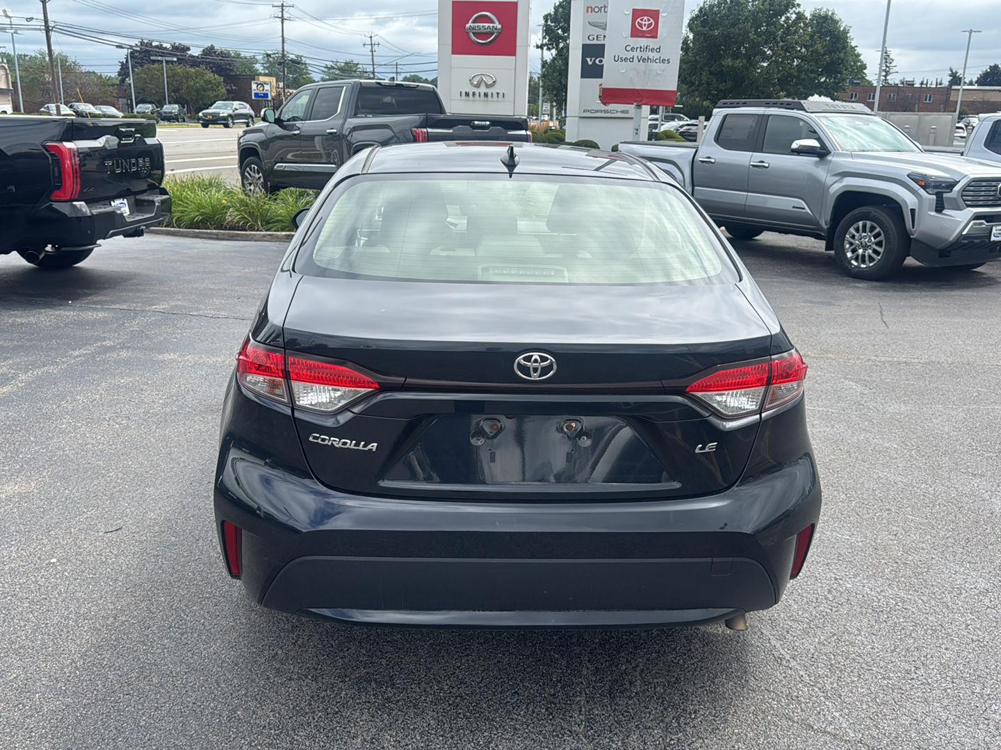Certified Used 2021 Black Sand Pearl Toyota LE image 5