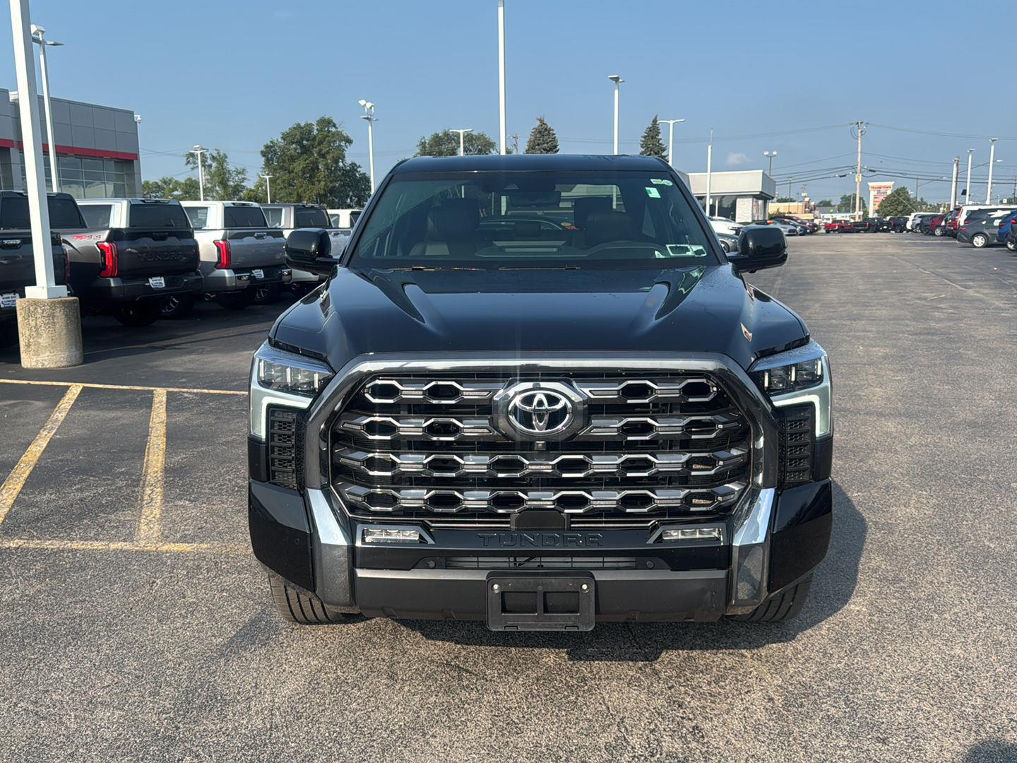 Used 2024 Midnight Black Metallic Toyota Platinum image 2