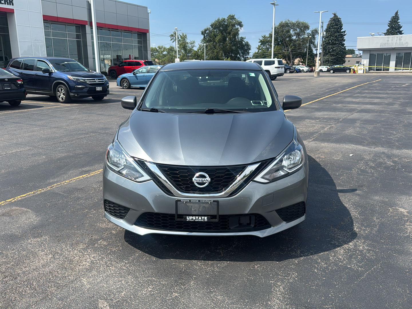 Used 2019 Gun Metallic Nissan SV image 2