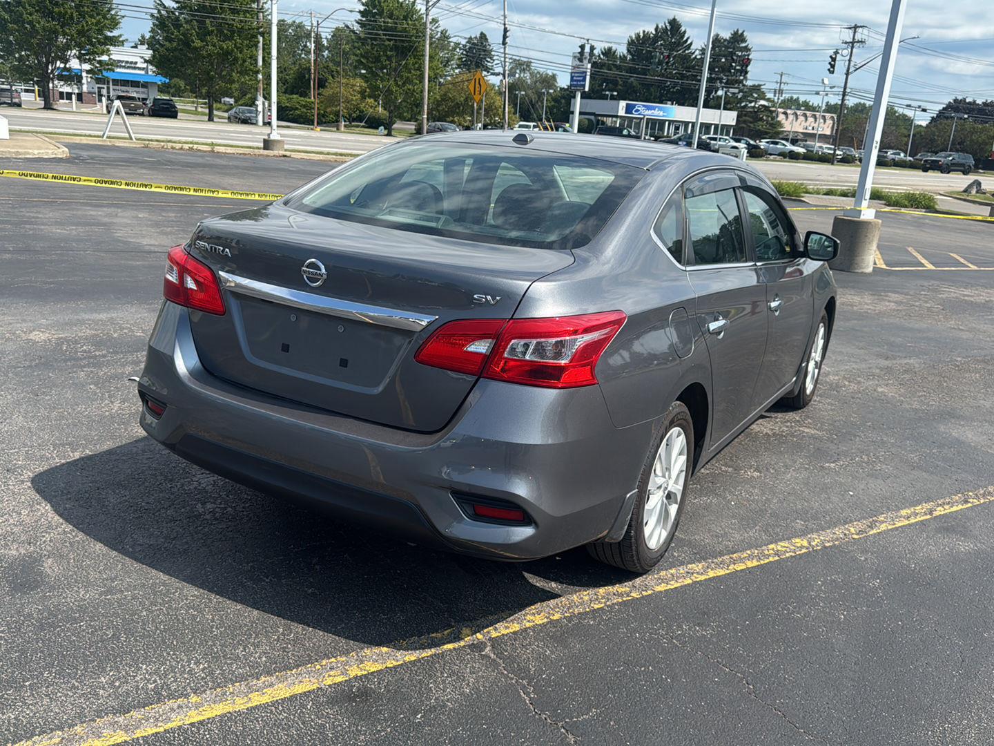 Used 2019 Gun Metallic Nissan SV image 6