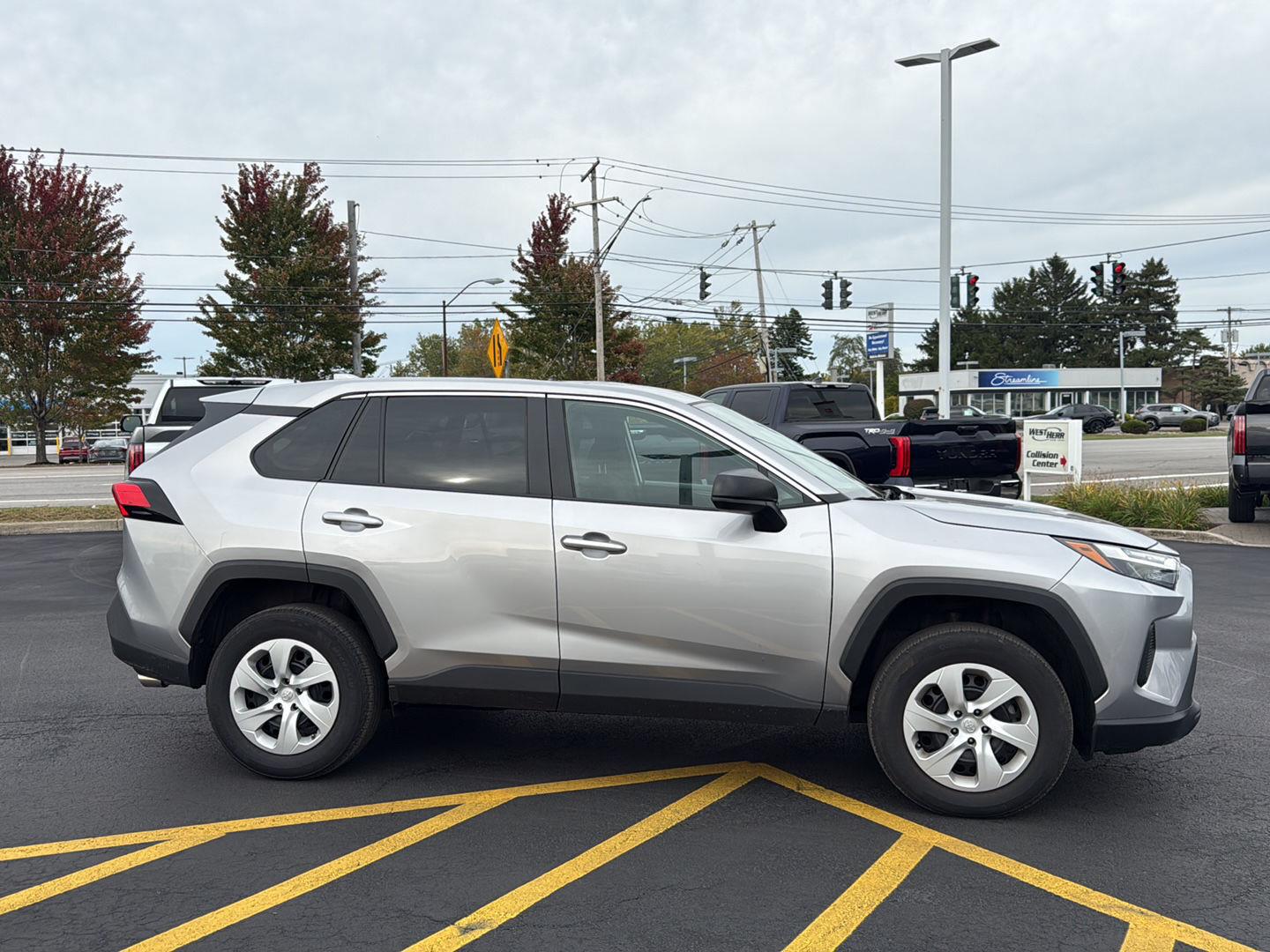 Certified Used 2023 Silver Sky Metallic Toyota LE image 2