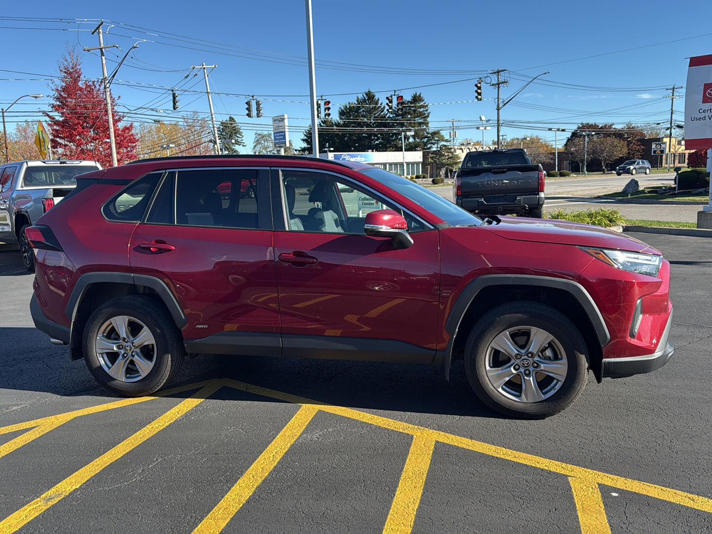 Certified Used 2025 Ruby Flare Pearl Toyota XLE image 2
