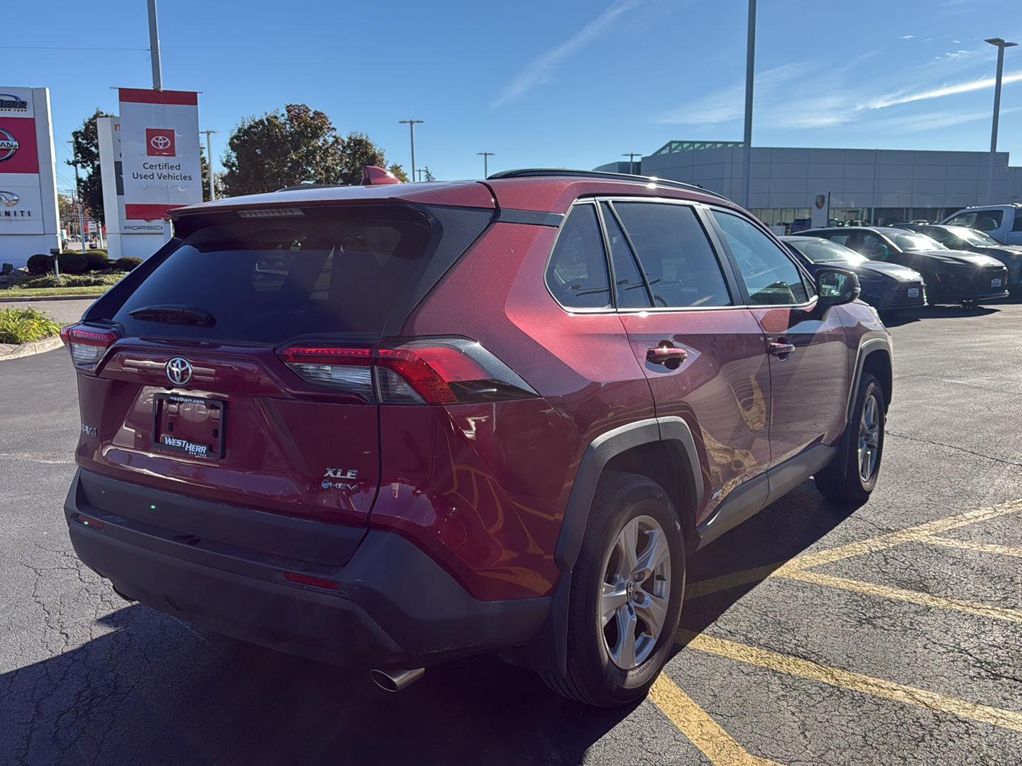 Certified Used 2025 Ruby Flare Pearl Toyota XLE image 3