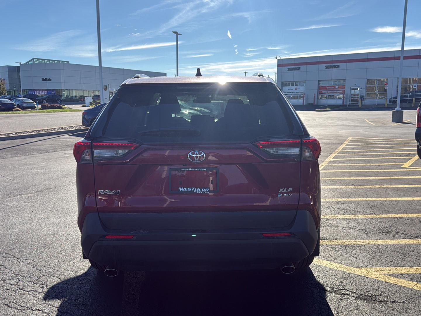 Certified Used 2025 Ruby Flare Pearl Toyota XLE image 4