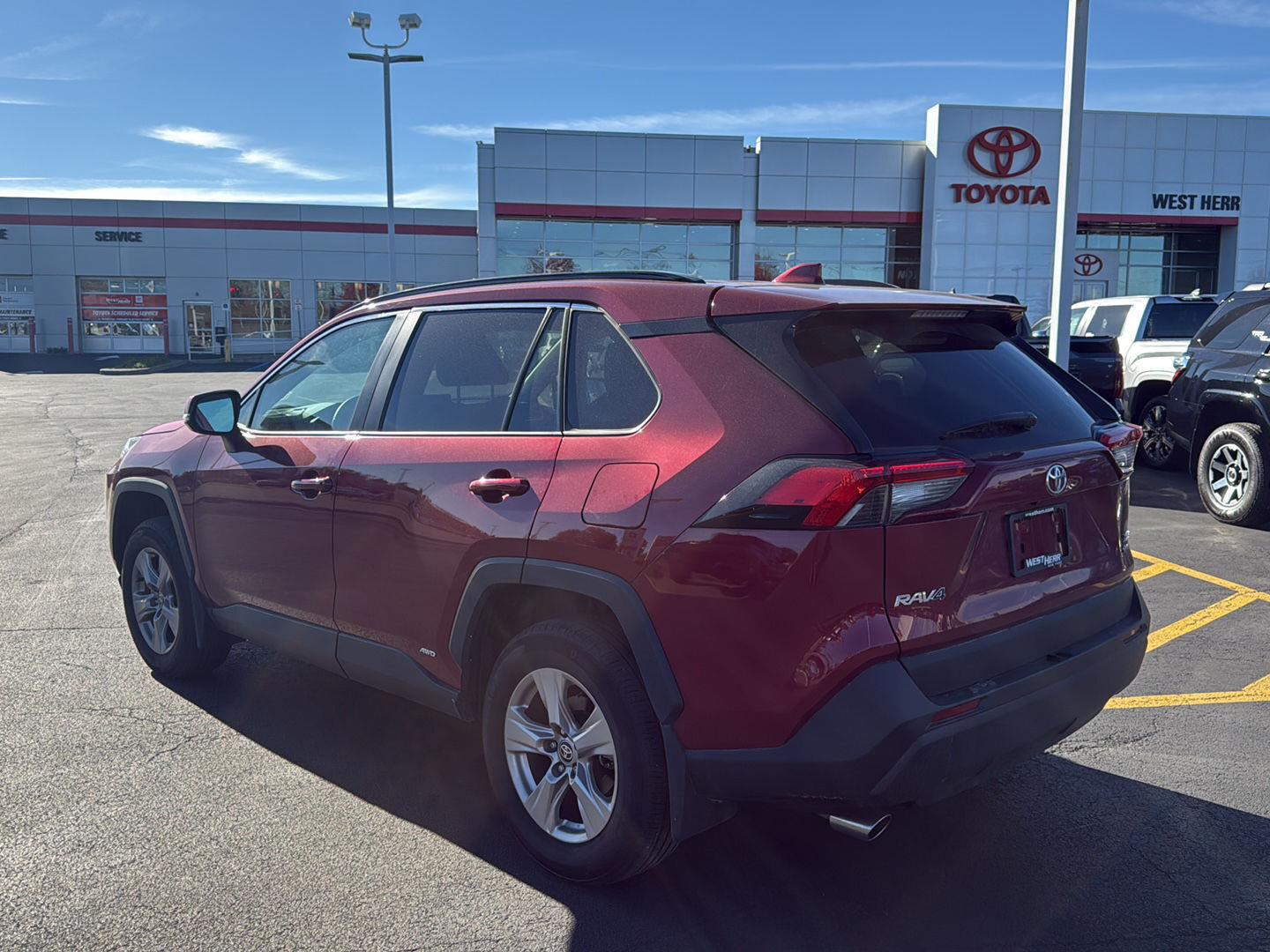 Certified Used 2025 Ruby Flare Pearl Toyota XLE image 5