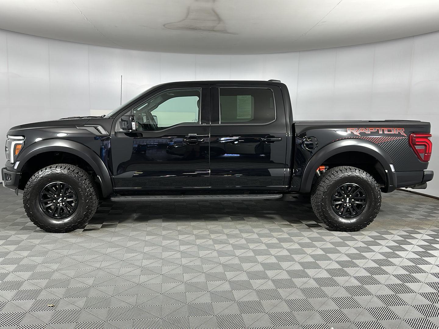Used 2025 Agate Black Metallic Ford Raptor image 12