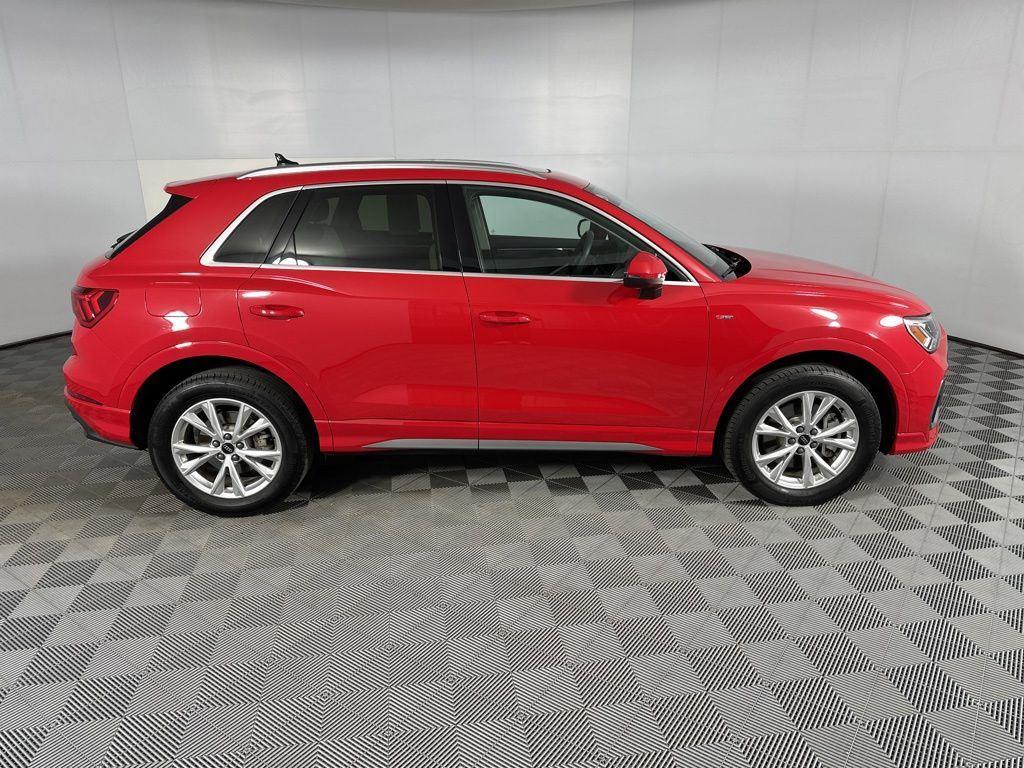 Used 2025 Progressive Red Metallic Audi Premium Plus image 4