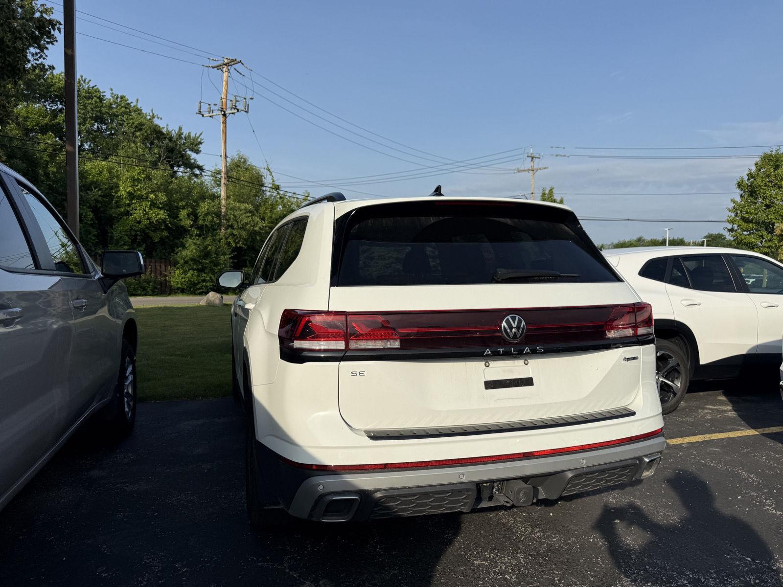 Used 2024 Pure White Volkswagen 2.0T Peak Edition SE w/Technology image 2