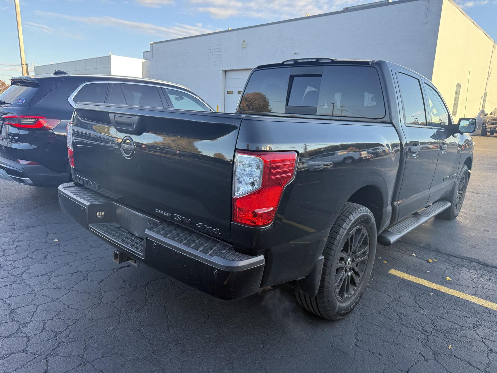 Used 2019 Magnetic Black Metallic Nissan SV image 2