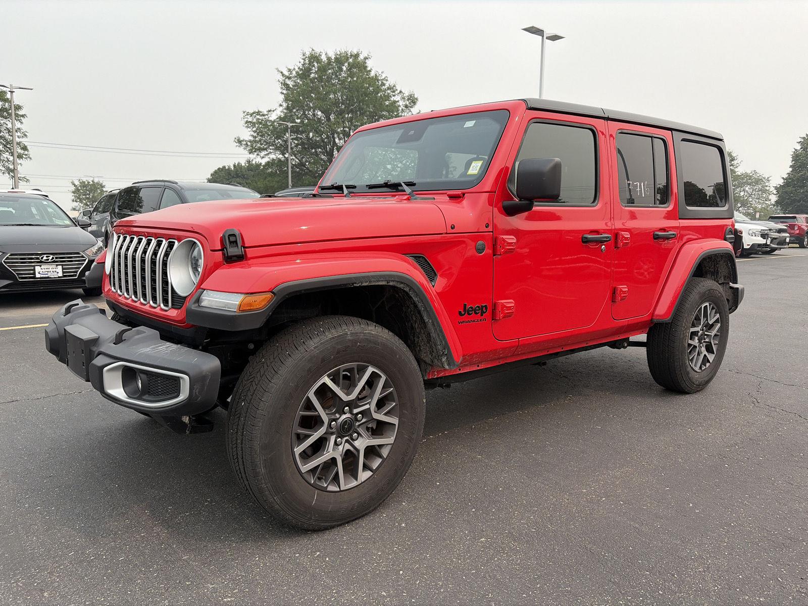Used 2026 Firecracker Red Jeep Sahara image 3