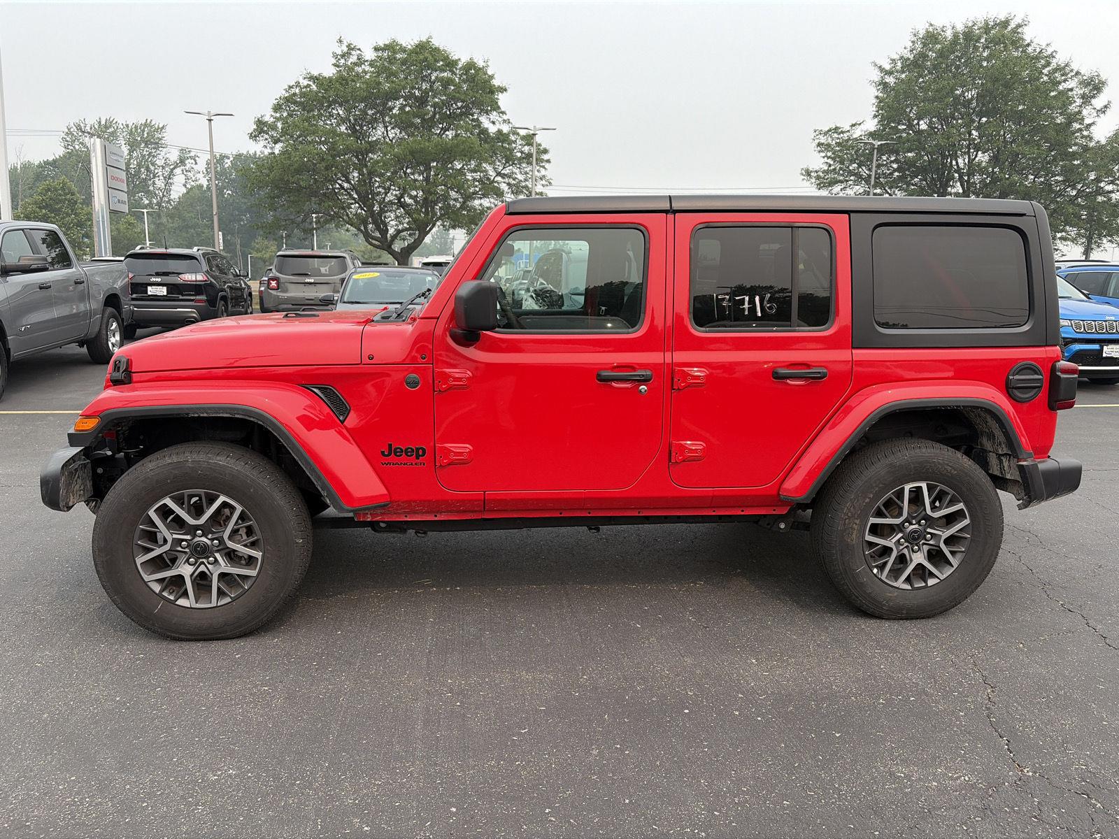 Used 2026 Firecracker Red Jeep Sahara image 4