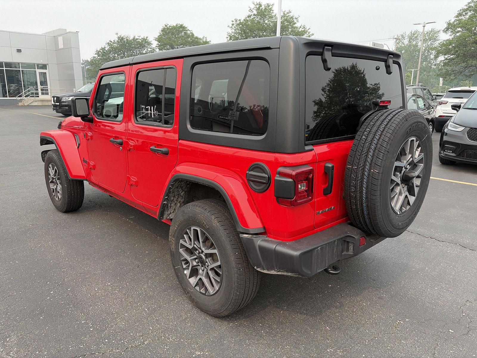 Used 2026 Firecracker Red Jeep Sahara image 5