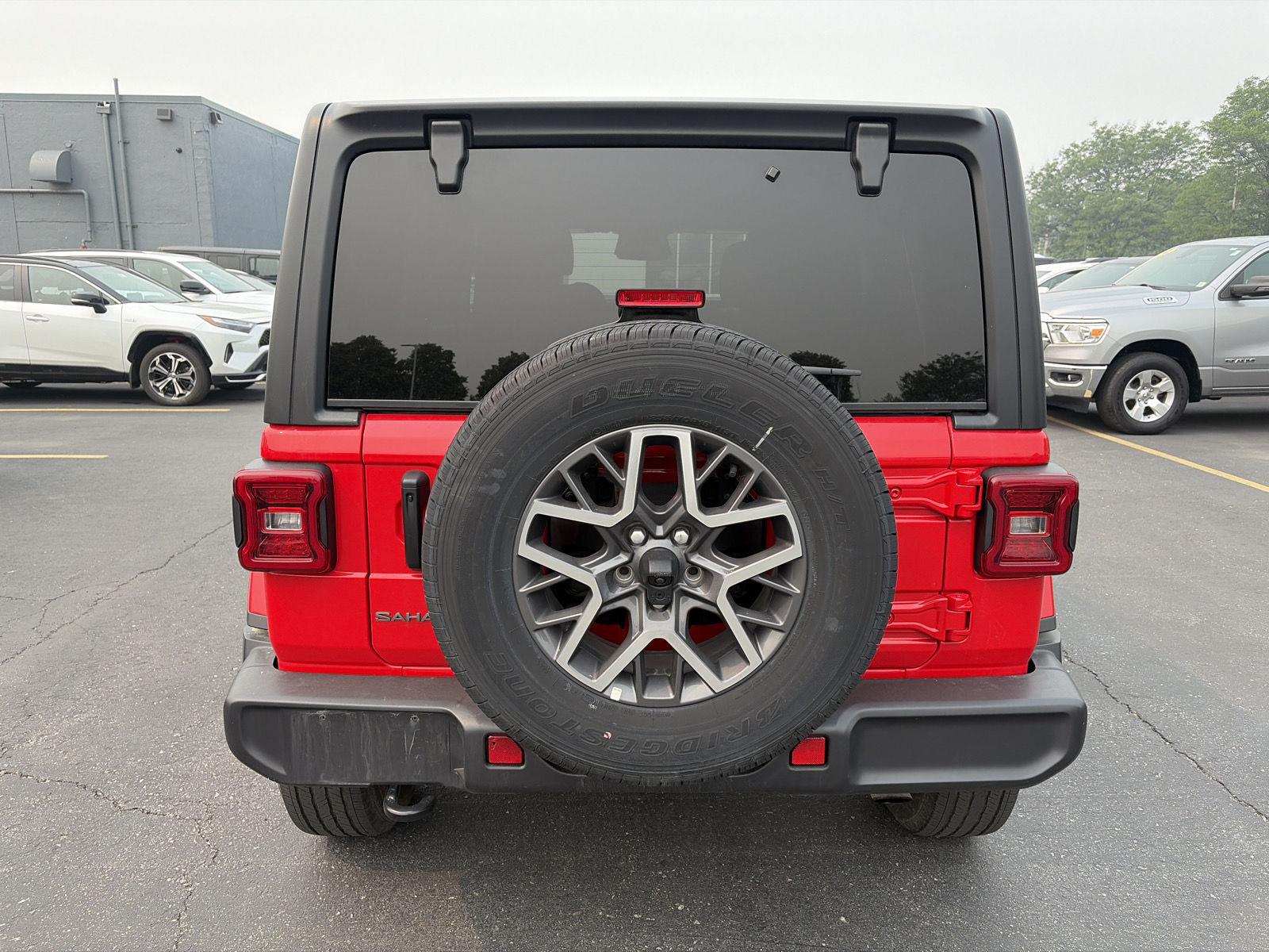 Used 2026 Firecracker Red Jeep Sahara image 6