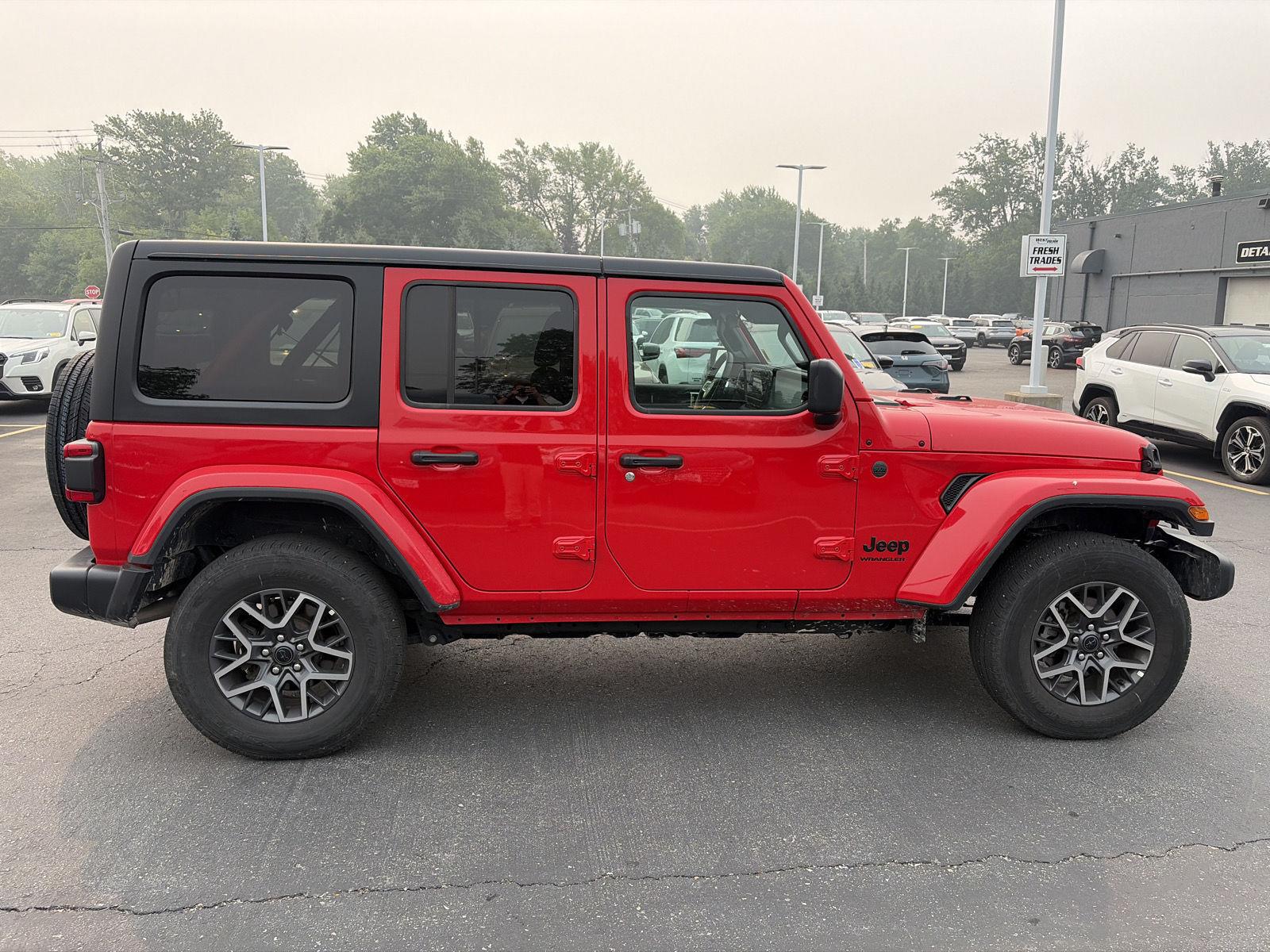 Used 2026 Firecracker Red Jeep Sahara image 8