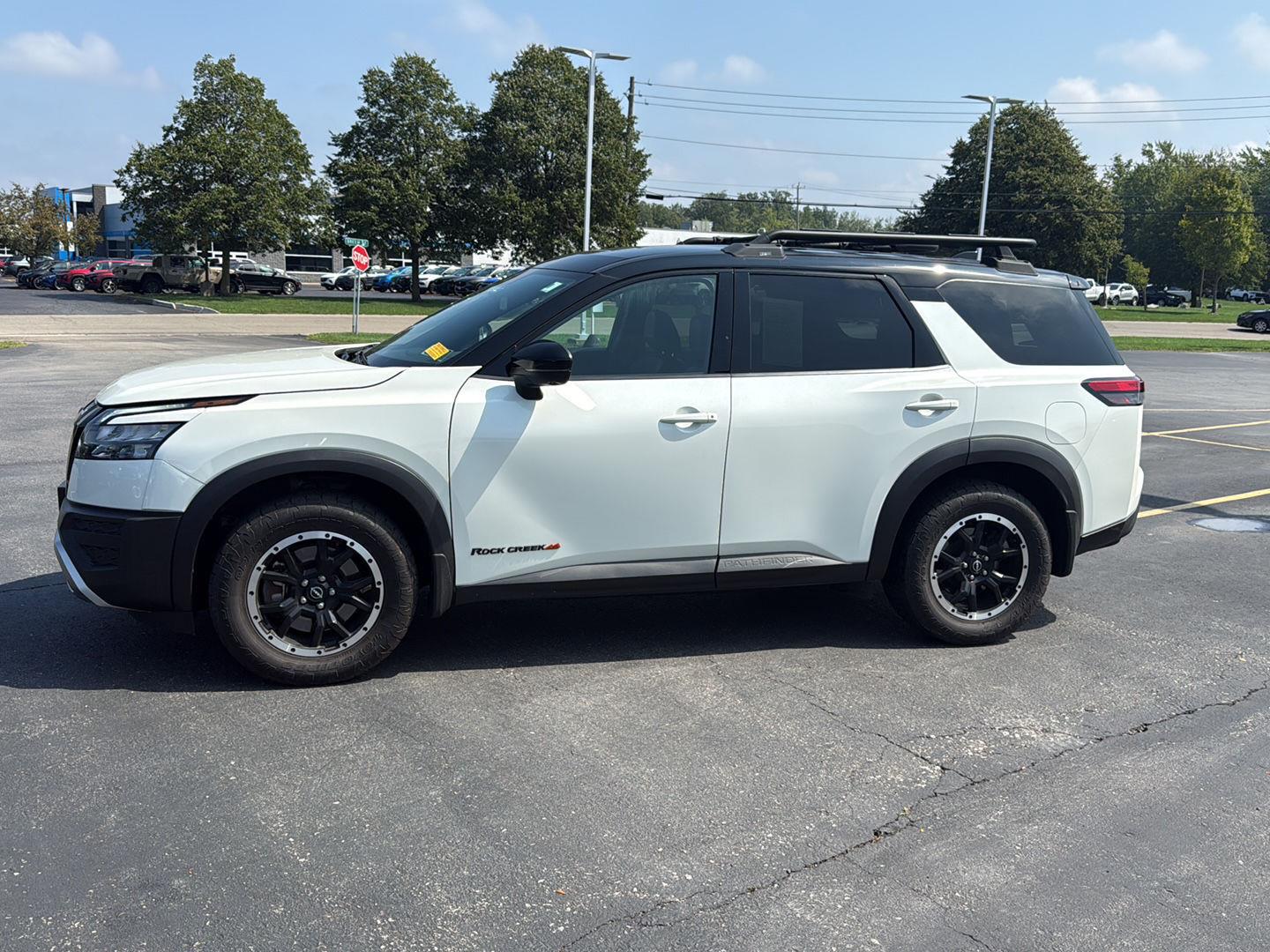 Used 2024 Pearl White Tricoat/Super Black Nissan Rock Creek image 3
