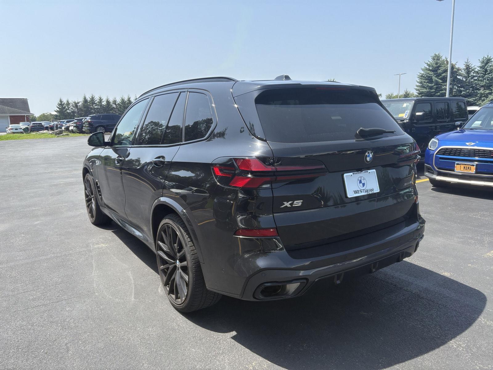 Used 2025 Black Sapphire Metallic BMW xDrive40i image 3