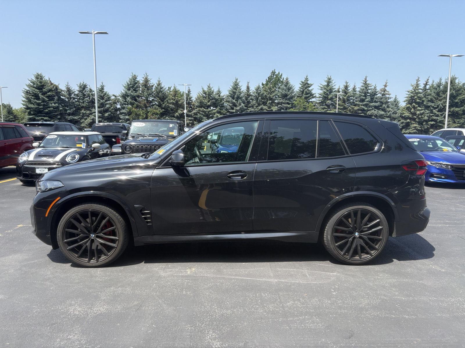 Used 2025 Black Sapphire Metallic BMW xDrive40i image 4