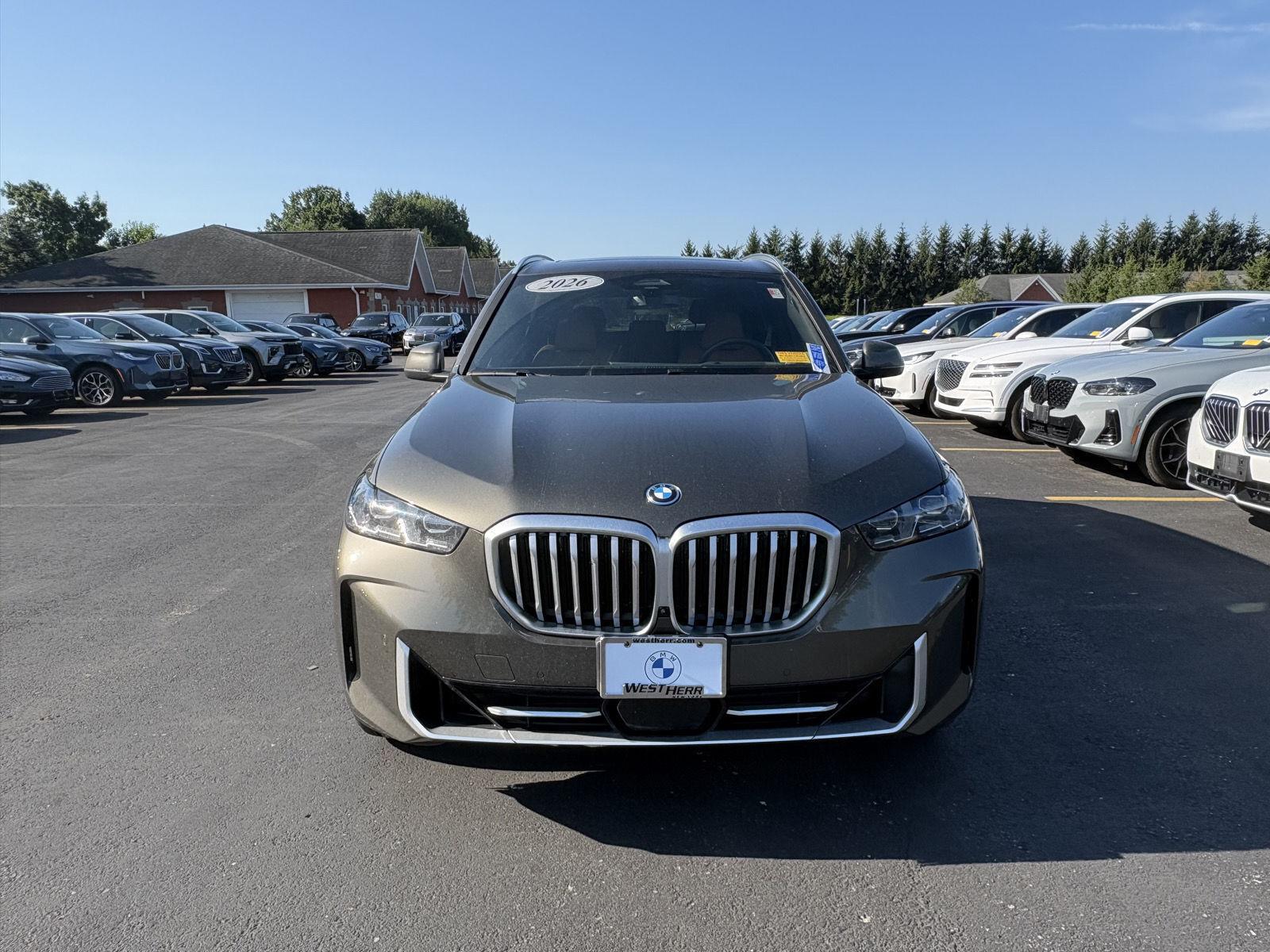 New 2026 Manhattan Green Metallic BMW xDrive50e image 2