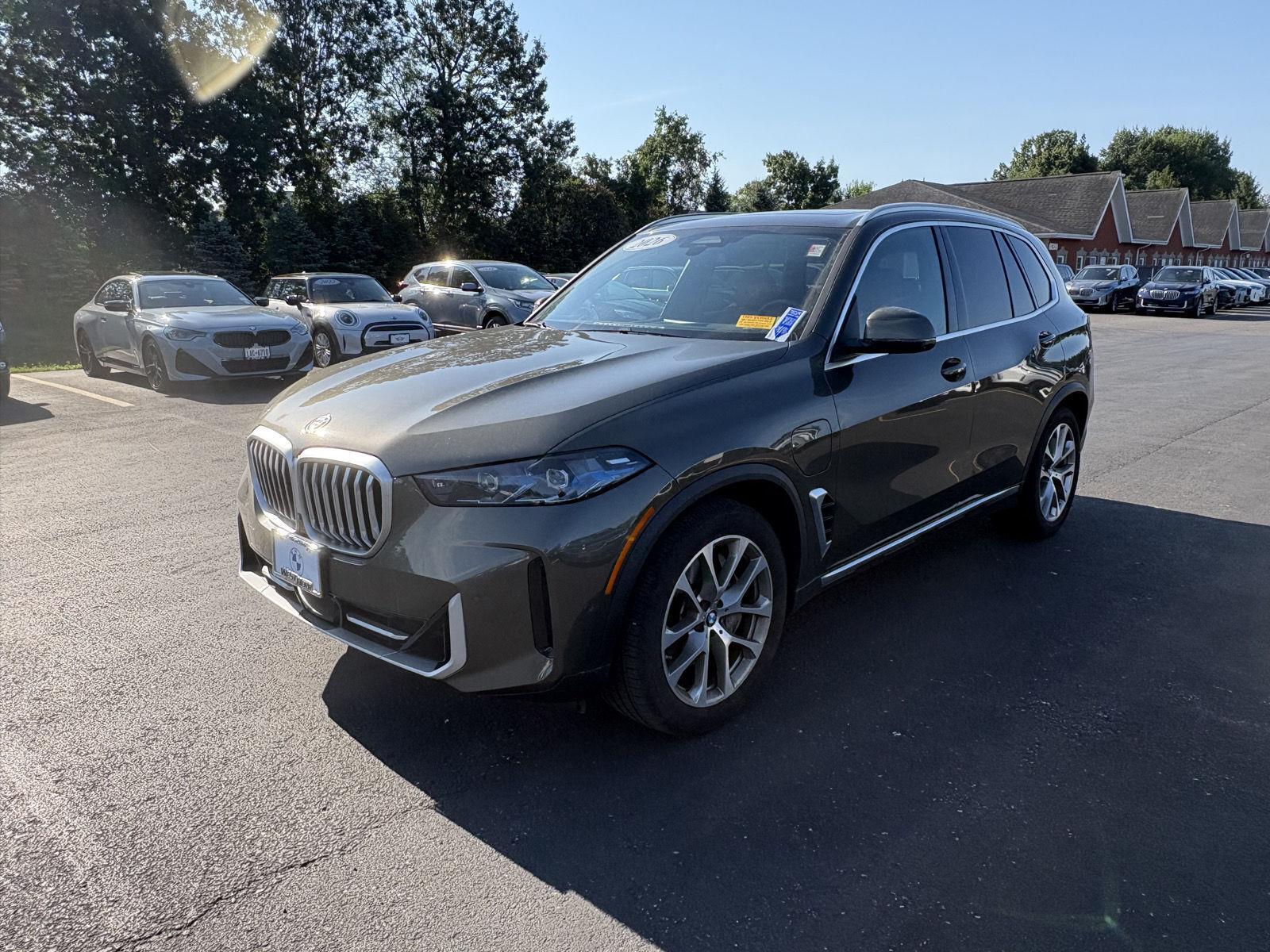 New 2026 Manhattan Green Metallic BMW xDrive50e image 3
