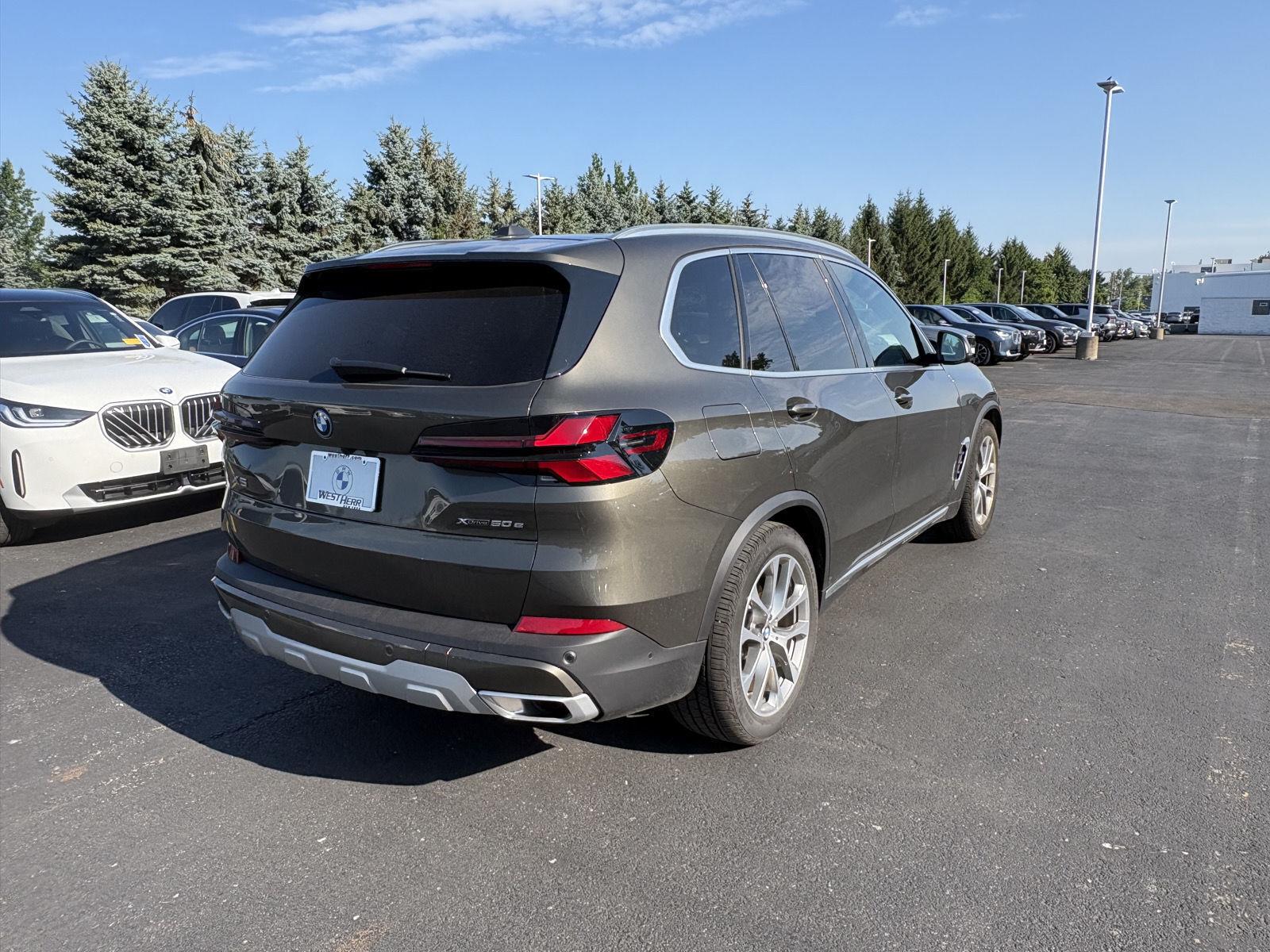 New 2026 Manhattan Green Metallic BMW xDrive50e image 5