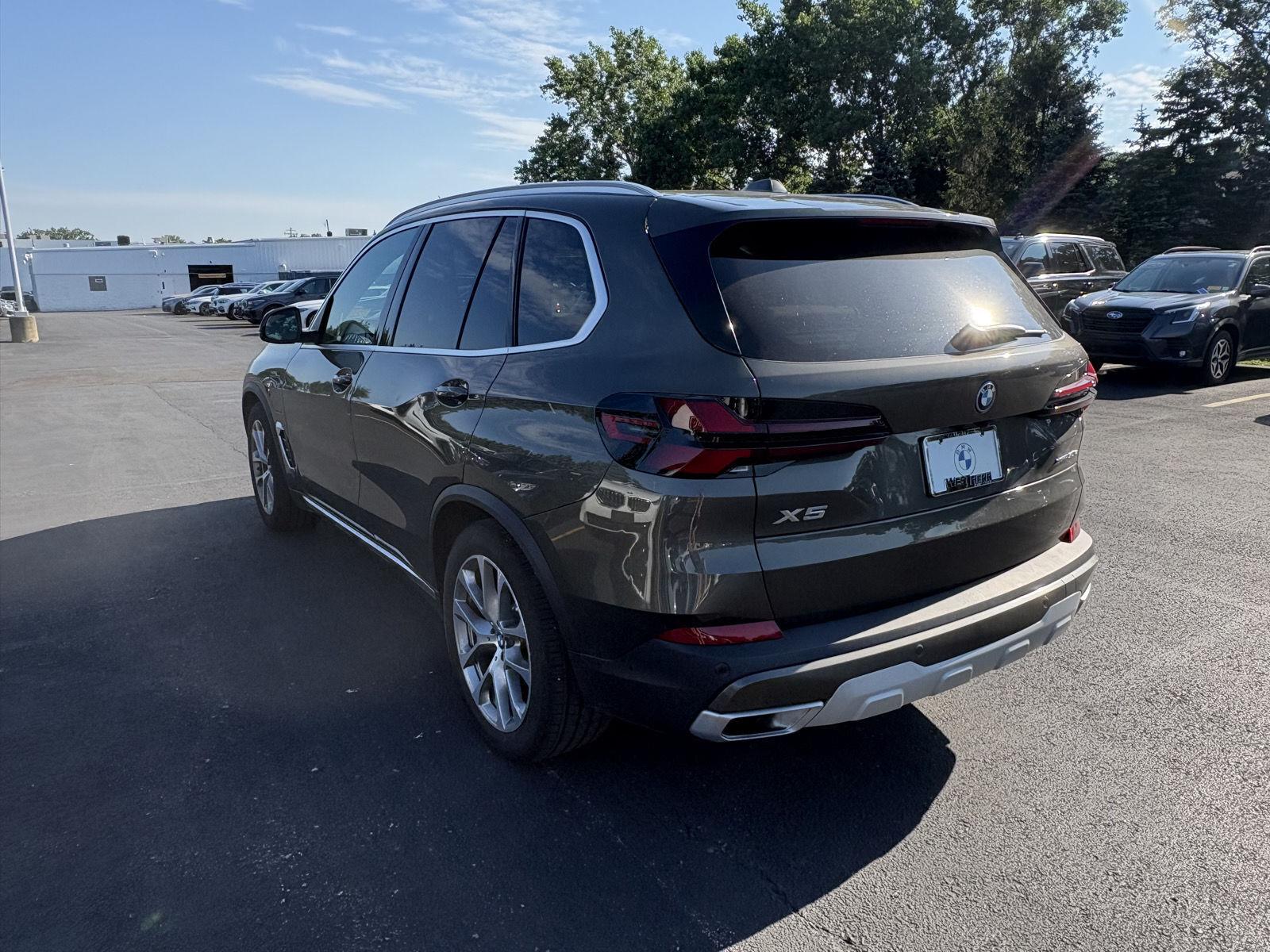 New 2026 Manhattan Green Metallic BMW xDrive50e image 7