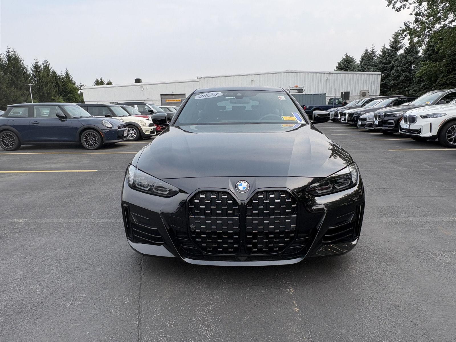 Used 2024 Black Sapphire Metallic BMW 430i xDrive image 2