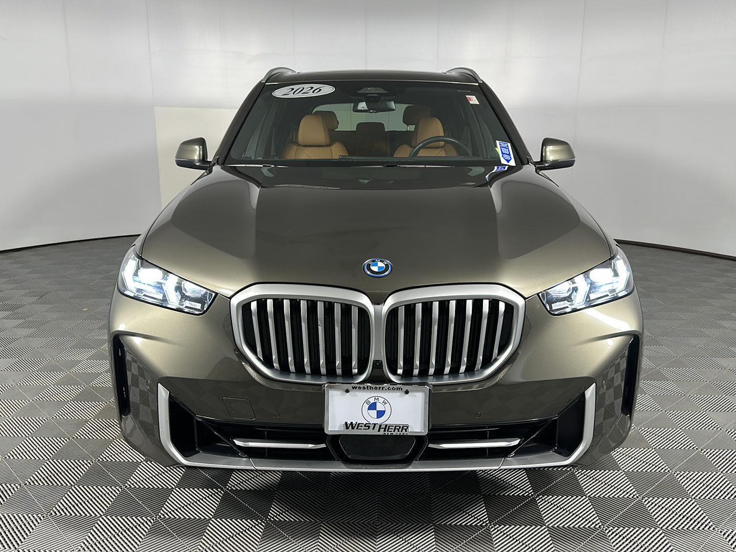 New 2026 Manhattan Green Metallic BMW xDrive50e image 11