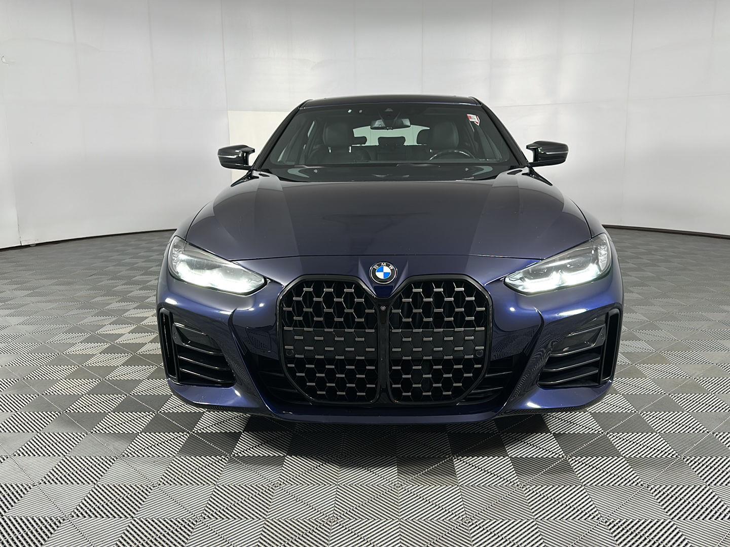 Used 2024 Tanzanite Blue II Metallic BMW M440i xDrive image 3