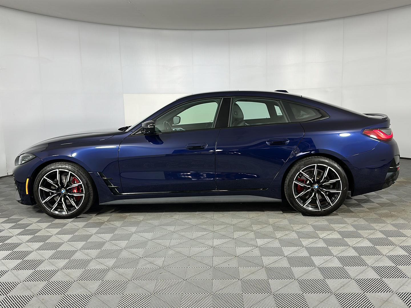 Used 2024 Tanzanite Blue II Metallic BMW M440i xDrive image 5
