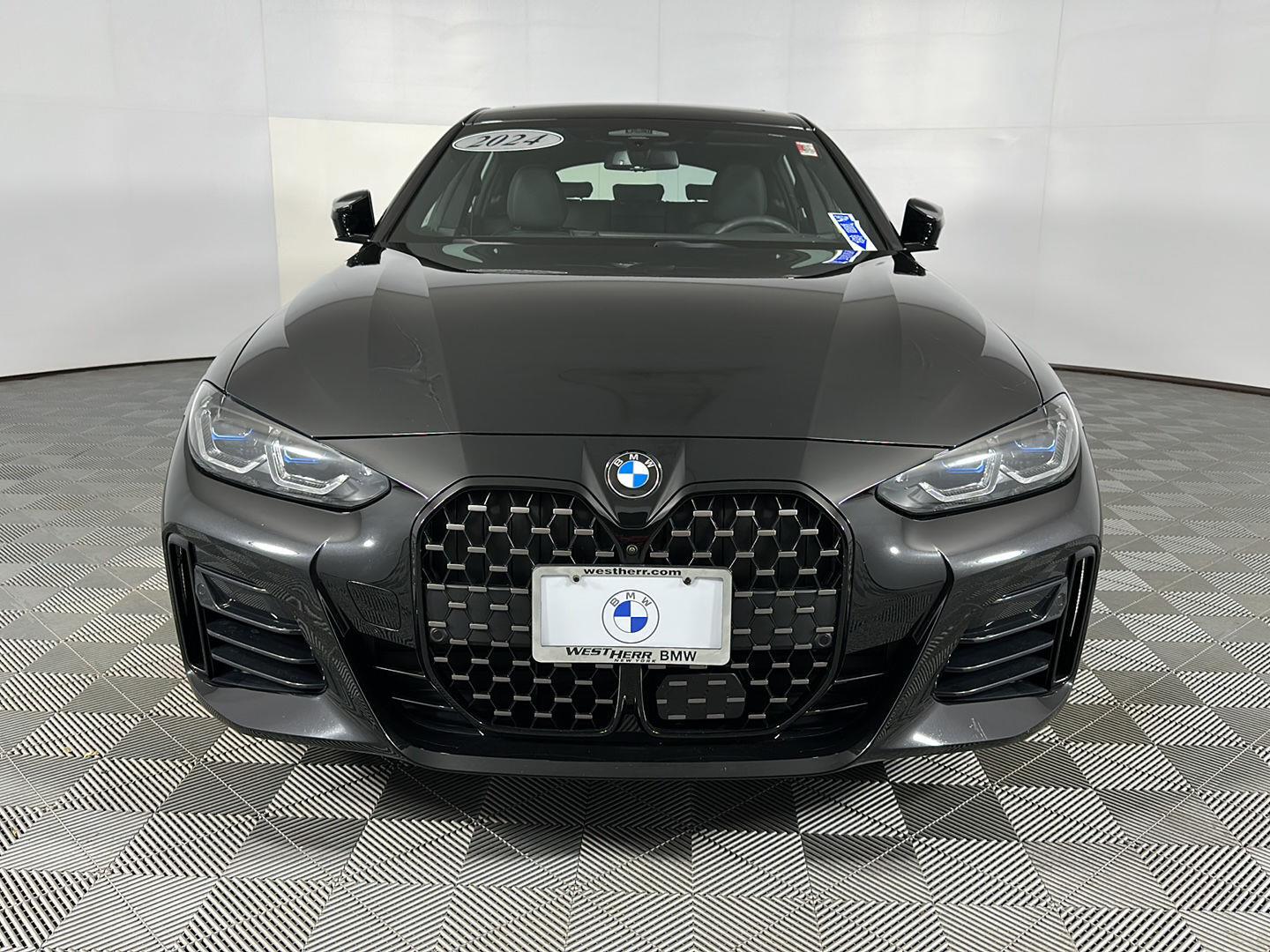 Used 2024 Black Sapphire Metallic BMW M440i xDrive image 2
