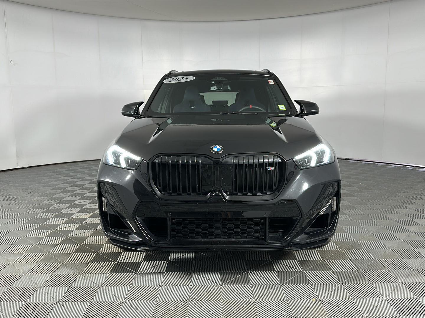 Used 2025 Black Sapphire Metallic BMW M35i image 2