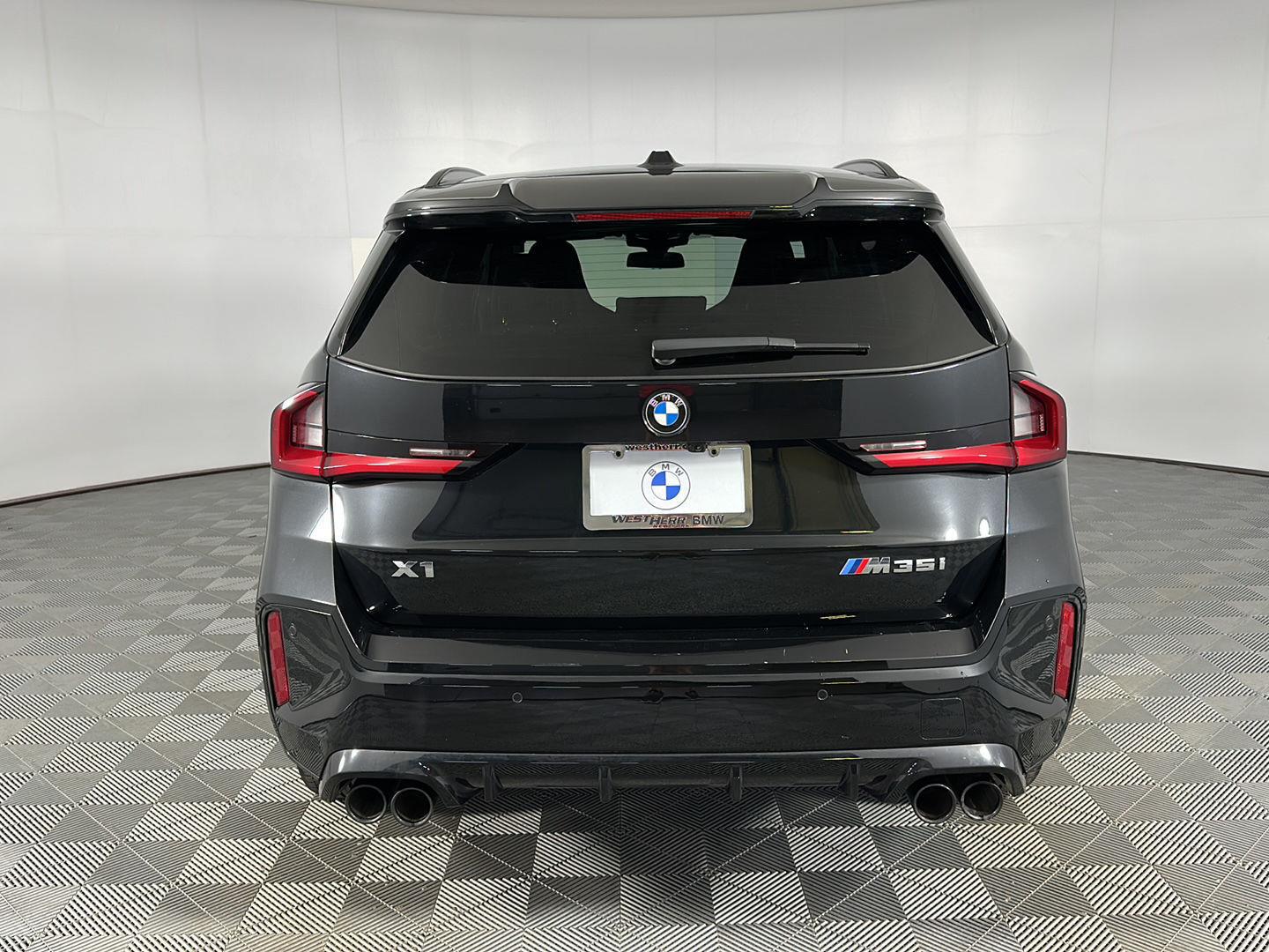 Used 2025 Black Sapphire Metallic BMW M35i image 21