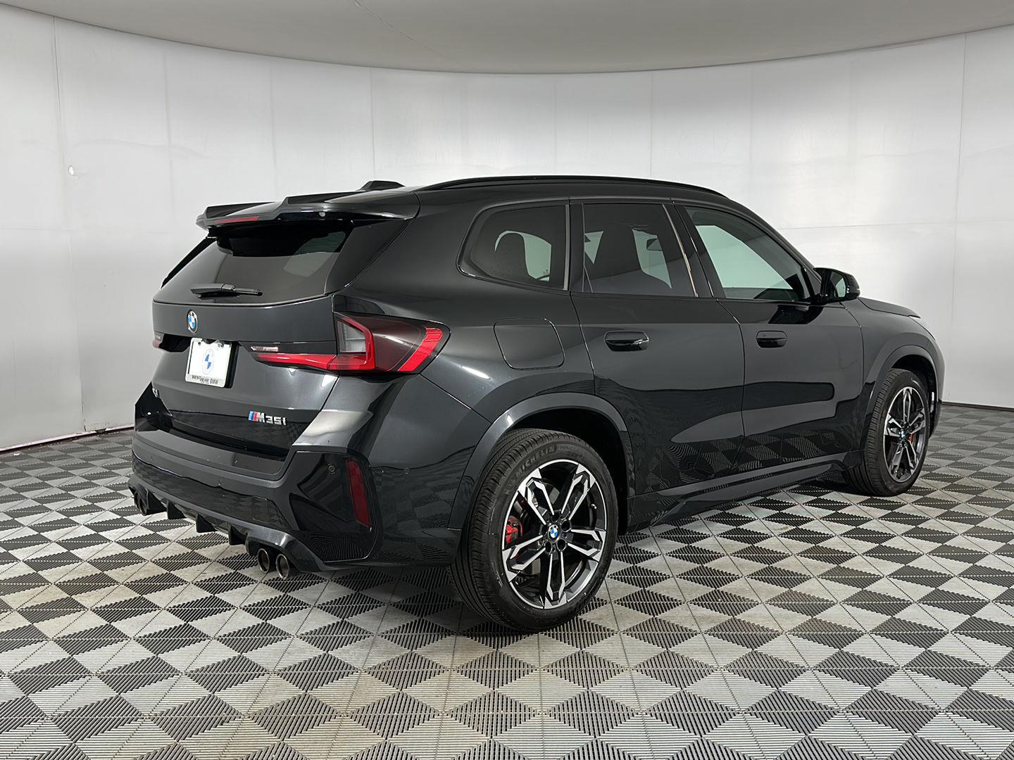 Used 2025 Black Sapphire Metallic BMW M35i image 24