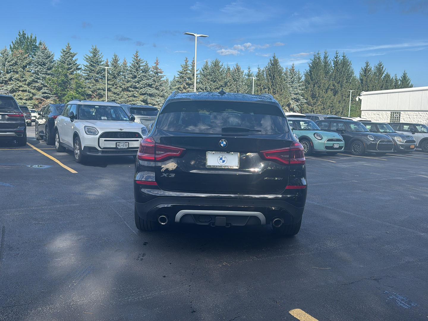 Used 2021 Black Sapphire Metallic BMW xDrive30i image 4