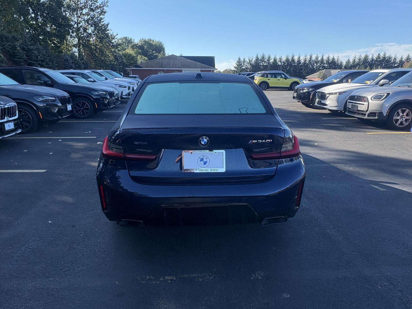 Certified Used 2024 Tanzanite Blue II Metallic BMW M340i xDrive image 6