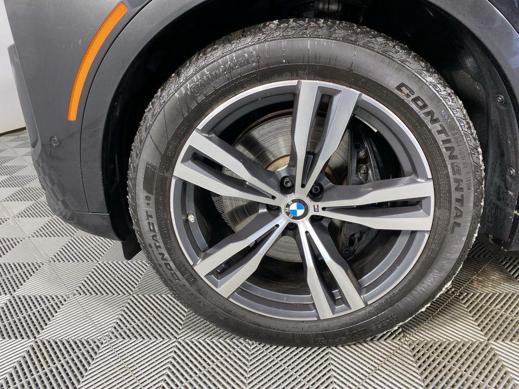 Certified Used 2025 Black Sapphire Metallic BMW M60i image 9