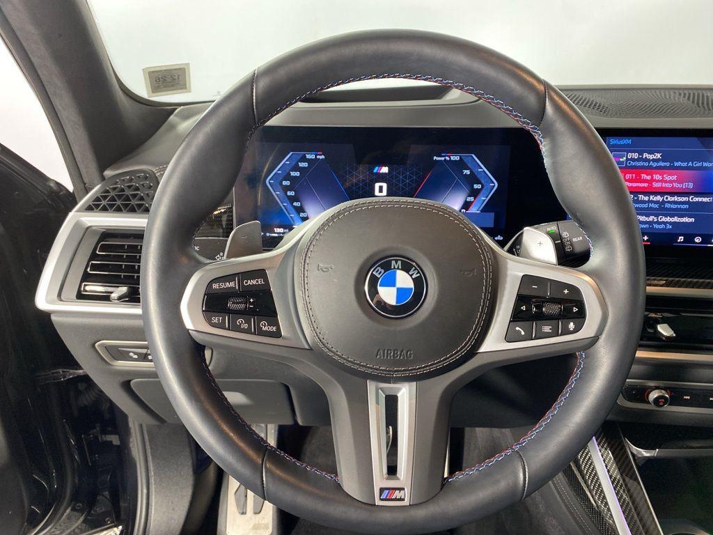 Certified Used 2025 Black Sapphire Metallic BMW M60i image 14