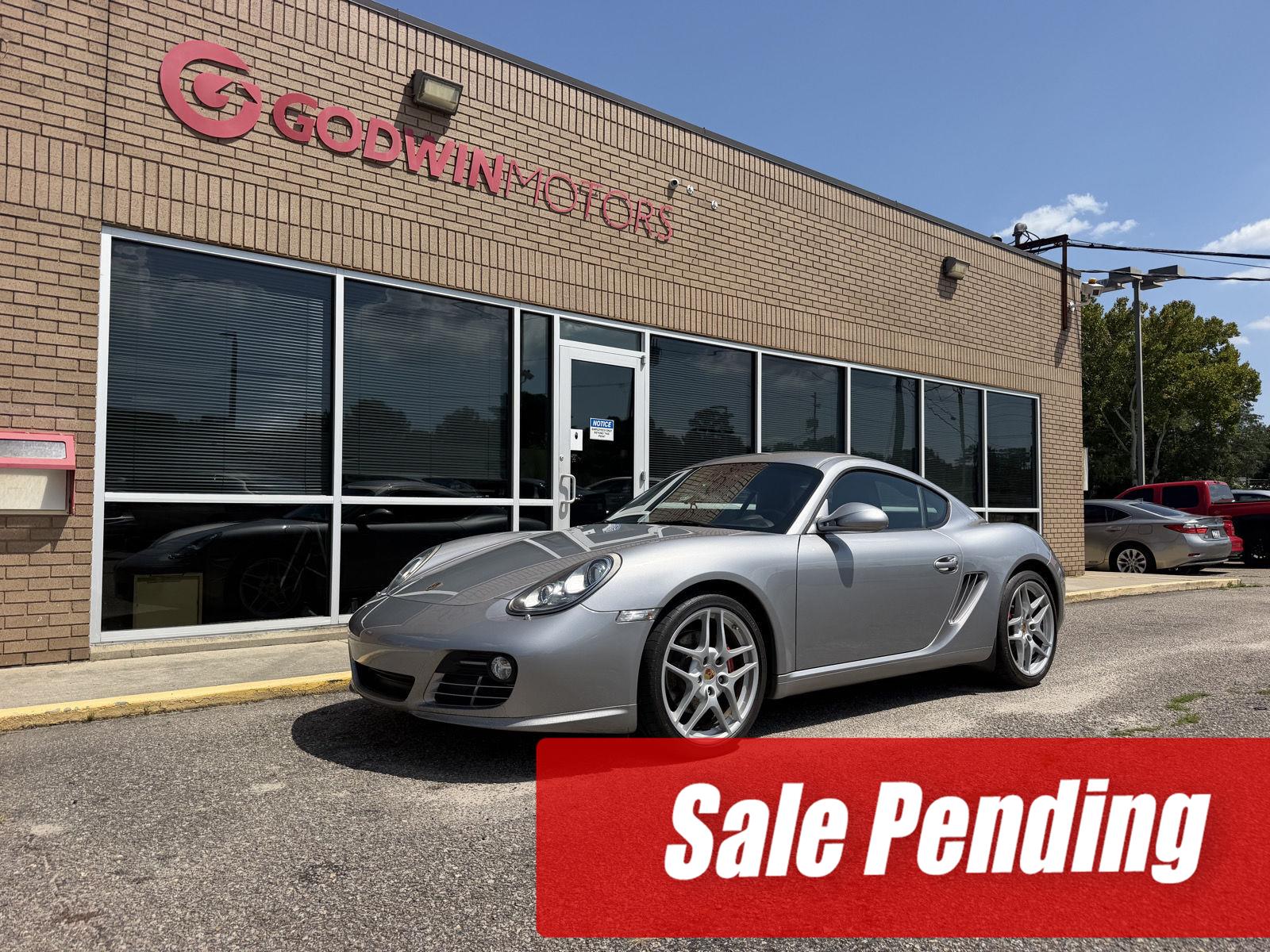 GT Silver Metallic 2010 Porsche Cayman Coupe Rear-Wheel Drive 6-Speed Manual