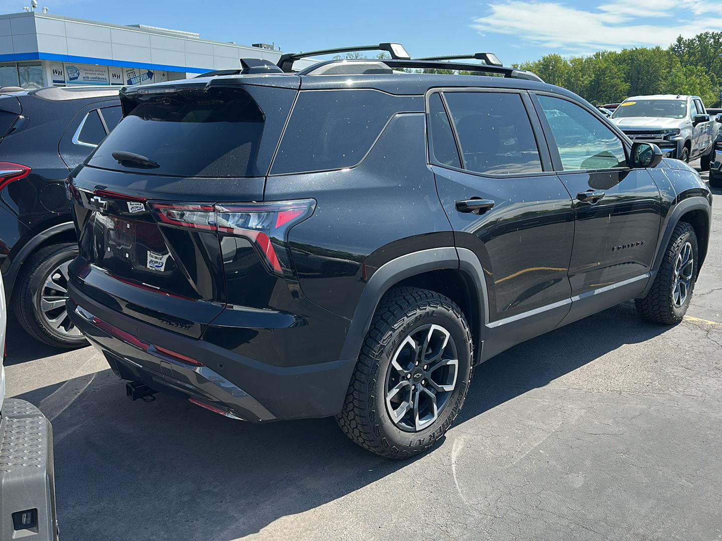 Used 2025 Mosaic Black Metallic Chevrolet AWD ACTIV image 2