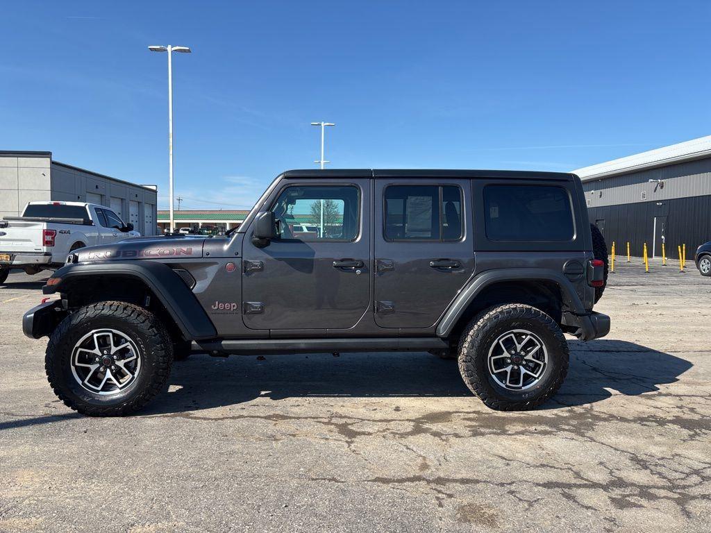 Used 2025 Granite Crystal Metallic Clear Jeep Rubicon image 4