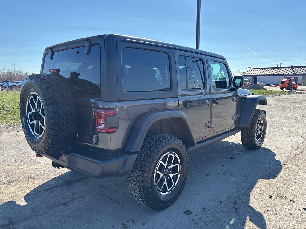 Used 2025 Granite Crystal Metallic Clear Jeep Rubicon image 7