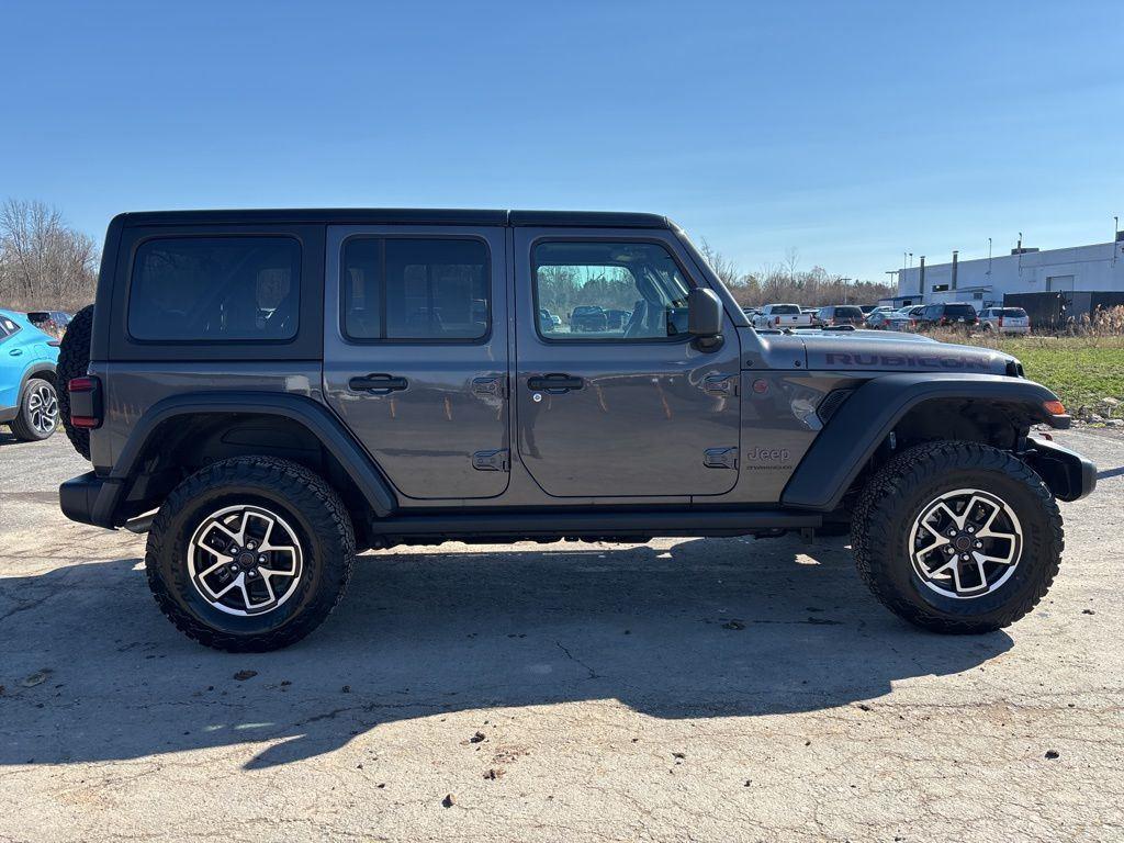 Used 2025 Granite Crystal Metallic Clear Jeep Rubicon image 8