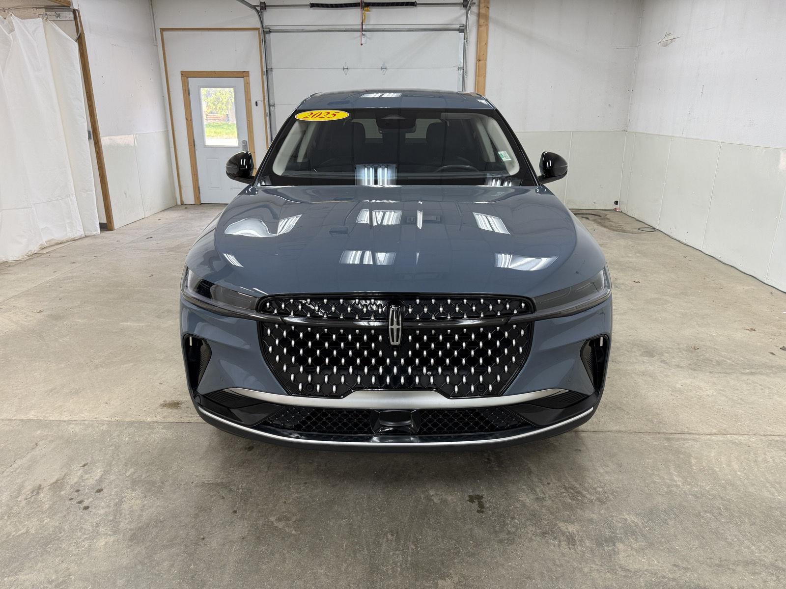 View vehicle photo 3