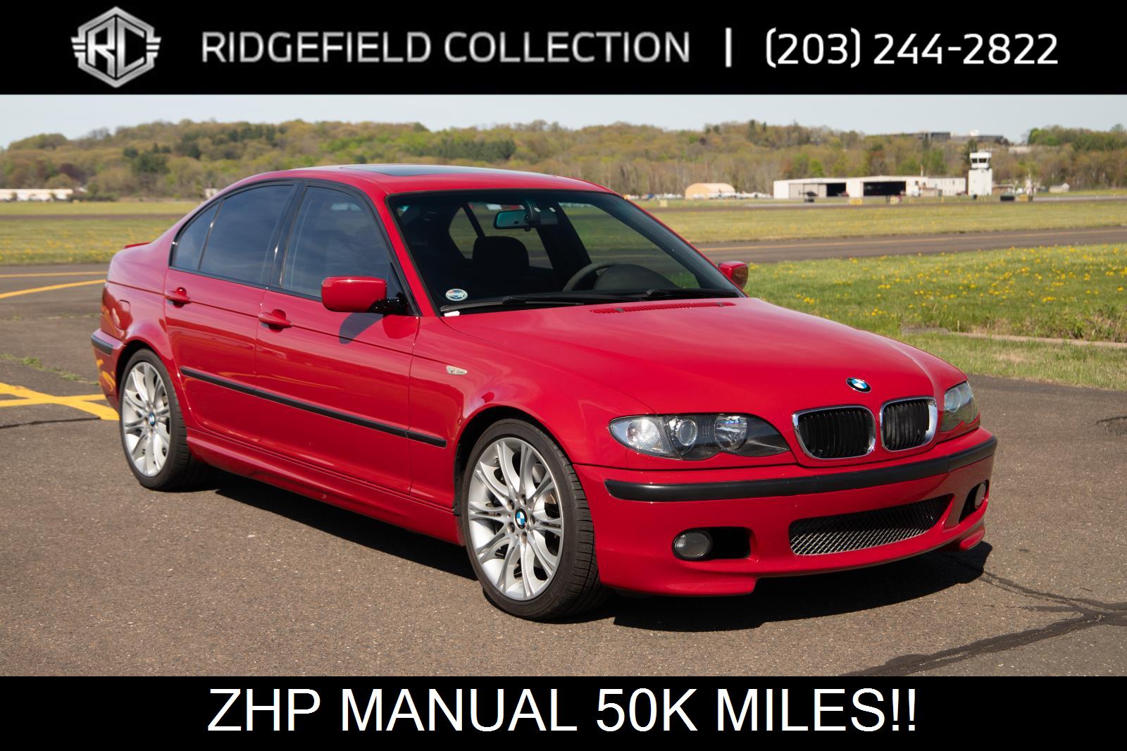 Red 2003 BMW 3 Series Sedan Rear-Wheel Drive 6-Speed Manual