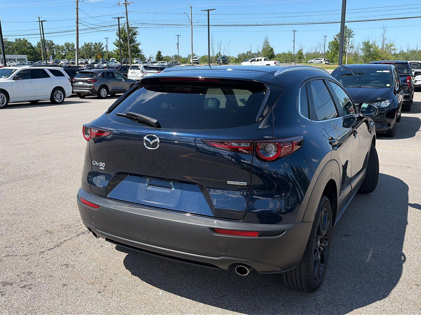 Used 2024 Deep Crystal Blue Mica Mazda 2.5 S Select Sport image 2