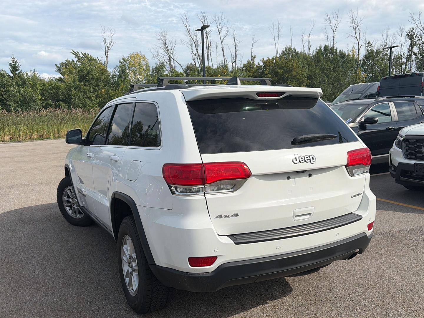 Used 2019 Bright White Clearcoat Jeep Laredo E image 3