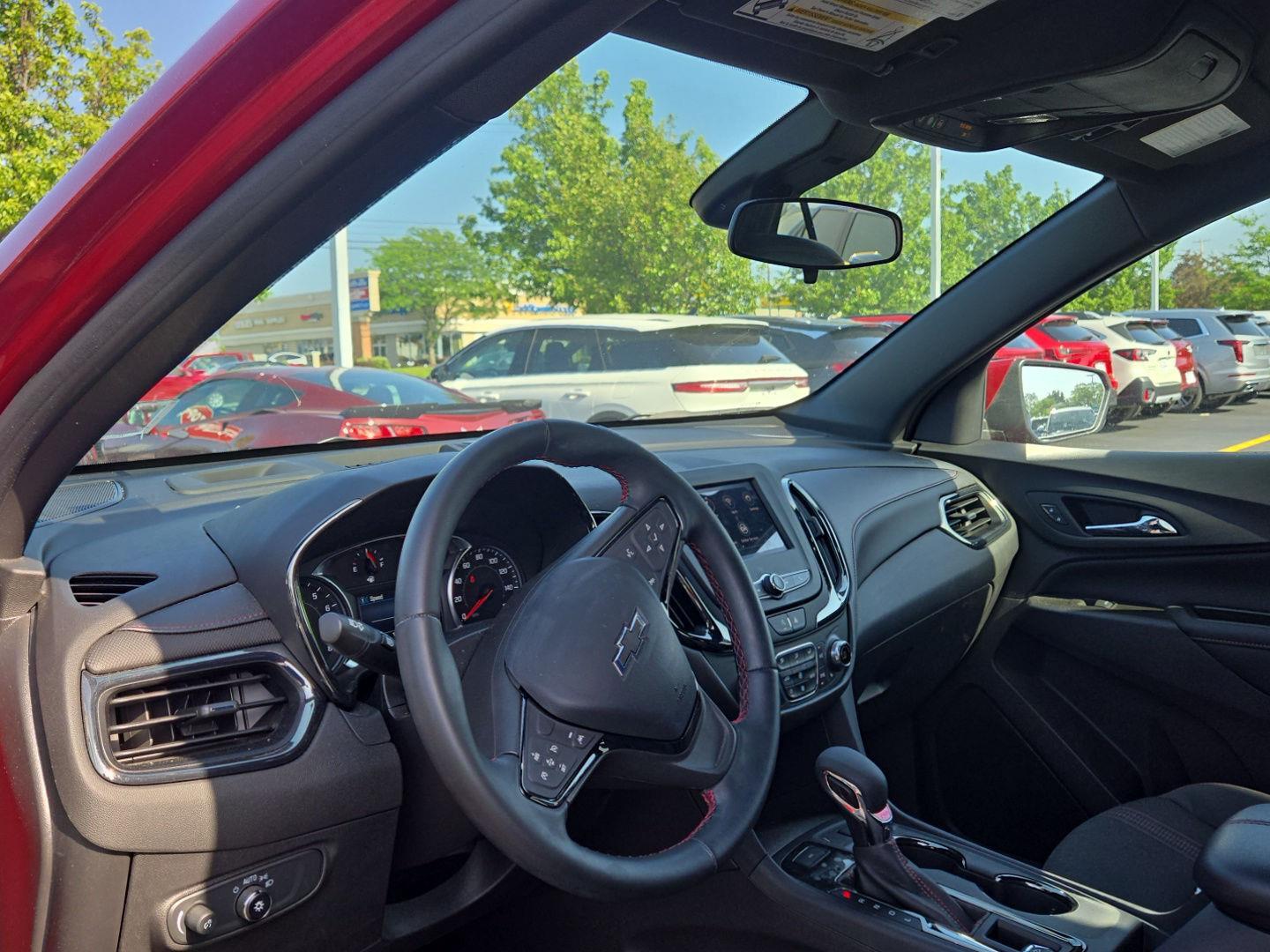 Used 2024 Radiant Red Tintcoat Chevrolet RS image 2