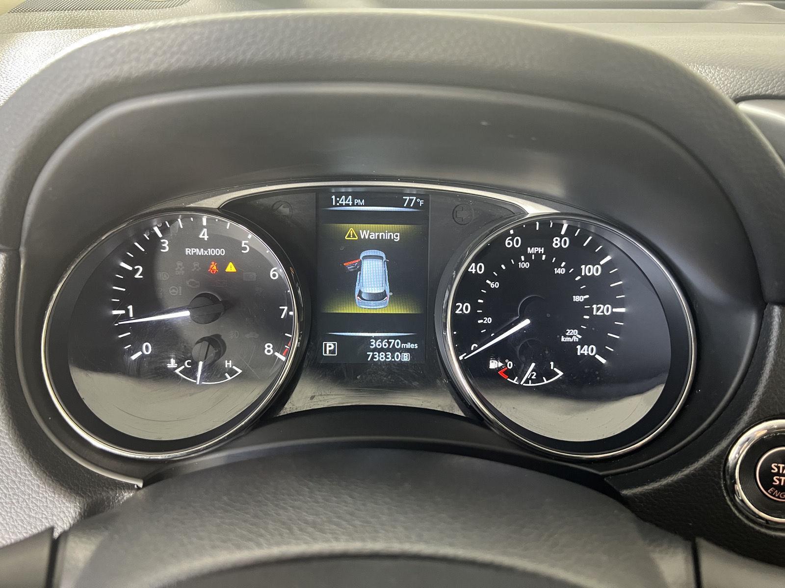 Used 2016 Magnetic Black Nissan SV image 13