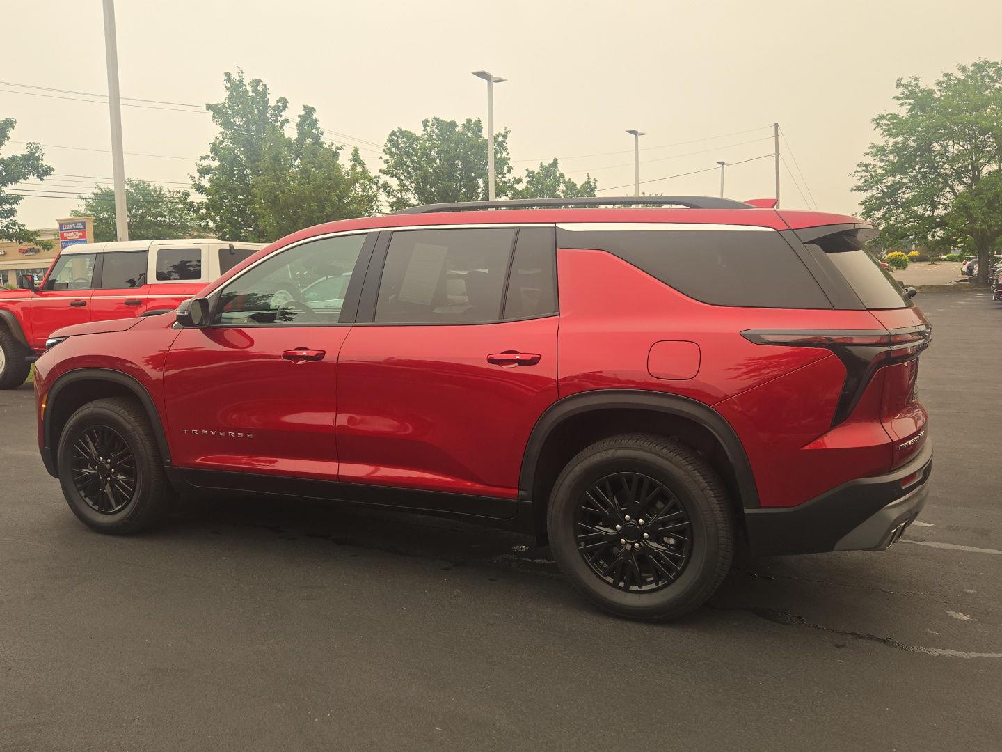 Used 2025 Radiant Red Tintcoat Chevrolet AWD LT image 3
